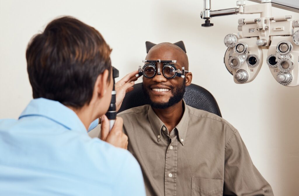 An adult having an eye exam to monitor for vision problems.